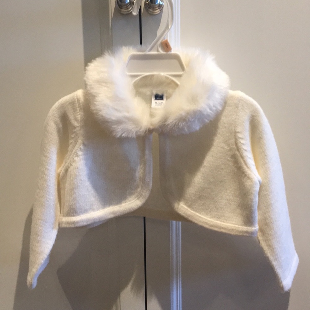 White bolero sweater with faux fur collar